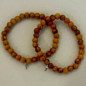Beaded wood bracelet with tiny silver cross.  💕